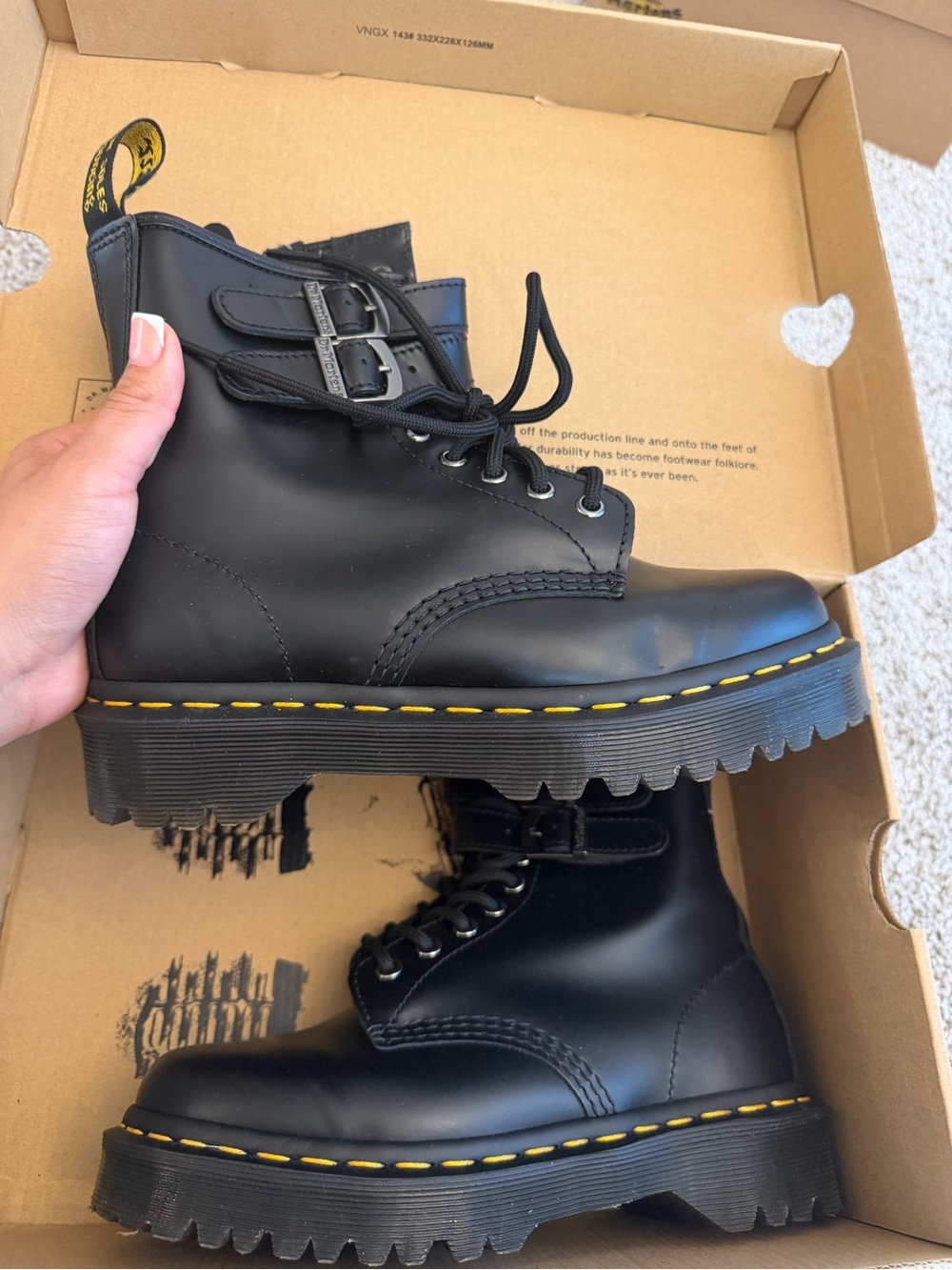 Dr. Martens Black Leather Lug-Soled Combat Boots with Yellow Stitching